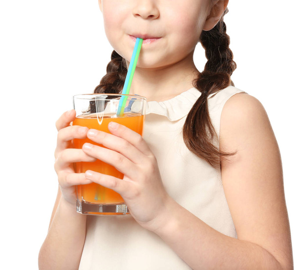 Cute little girl drinking juice - Фото, зображення