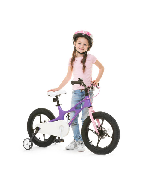 Cute little girl with bicycle - Zdjęcie, obraz