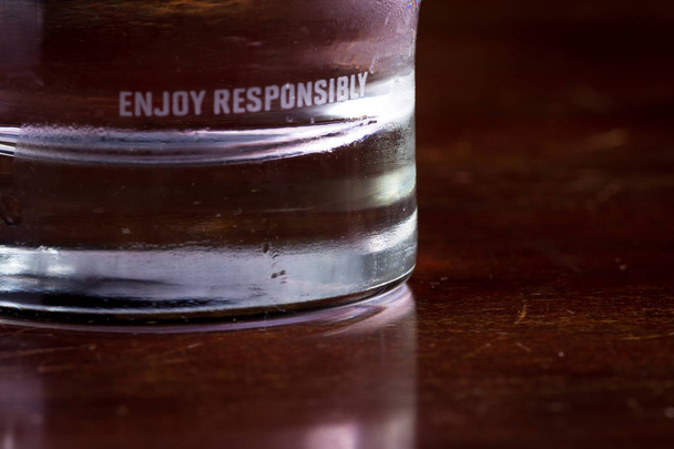 enjoy responsibly edged on a glass  - Photo, Image