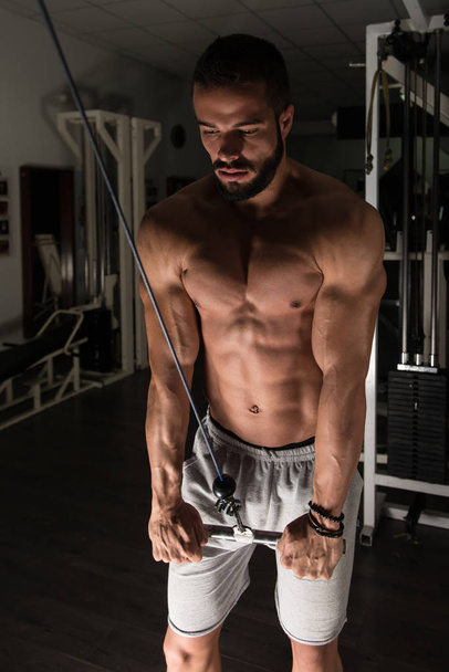 Muscular Model Exercising Triceps - Foto, Imagem