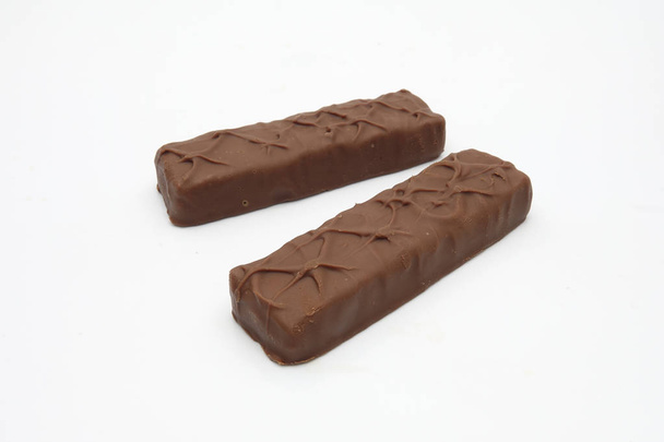 Close-up van chocoladereep geïsoleerd op wit - Foto, afbeelding