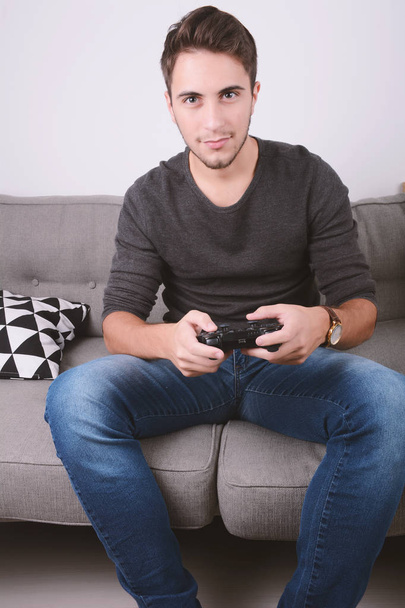 Man playing videogames. - Zdjęcie, obraz