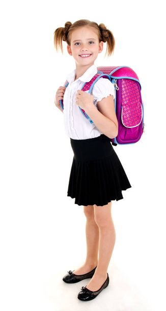 Portrait of smiling school girl child with backpack in uniform i - Foto, immagini