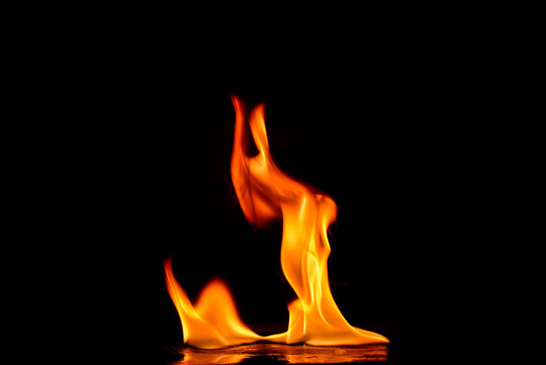 Beautiful fire flames on black background. - Fotografie, Obrázek