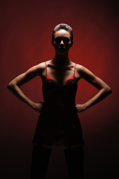 Horror woman over red background - Foto, imagen