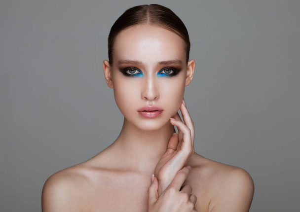 Beauty fashion model with blue lines makeup - Fotografie, Obrázek