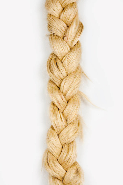 Braid of Artificial Hair Isolated on White. - Valokuva, kuva