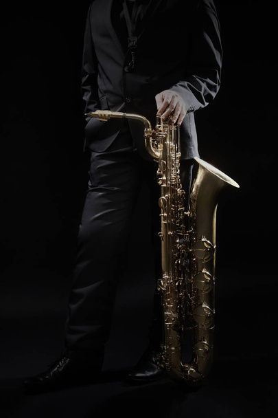 Saxophone player jazz musician with baritone sax - Φωτογραφία, εικόνα