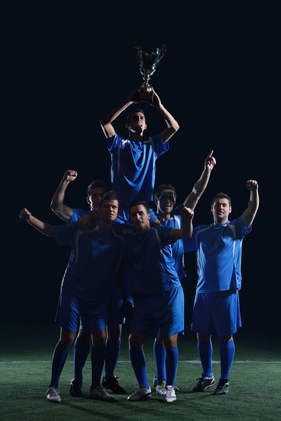 Soccer players celebrating victory - Fotoğraf, Görsel