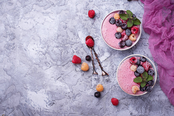 Smoothie bowl with frozen berry - Fotoğraf, Görsel