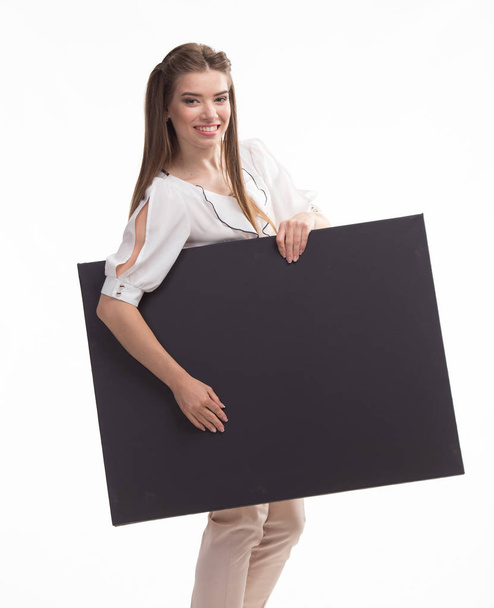 Young sexy woman showing presentation, pointing on placard - Fotó, kép