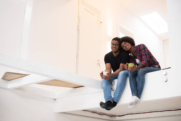 couple having break during moving to new house - Φωτογραφία, εικόνα
