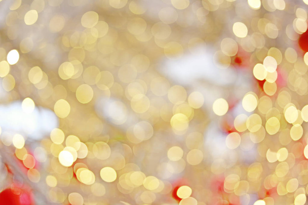 Golden bokeh blur background and red ball. - Photo, Image