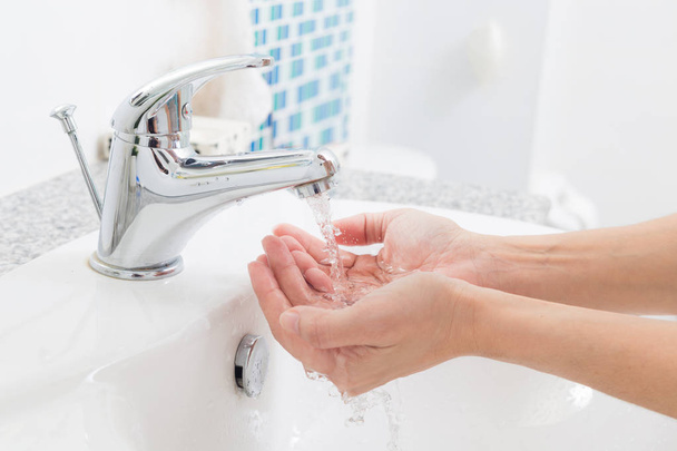 Hygiene. Cleaning Hands with water. Washing hands on sink. - Foto, imagen