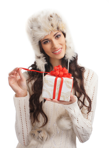 Portrait of young, sexy girl with the Christmas present isolated on white - Zdjęcie, obraz