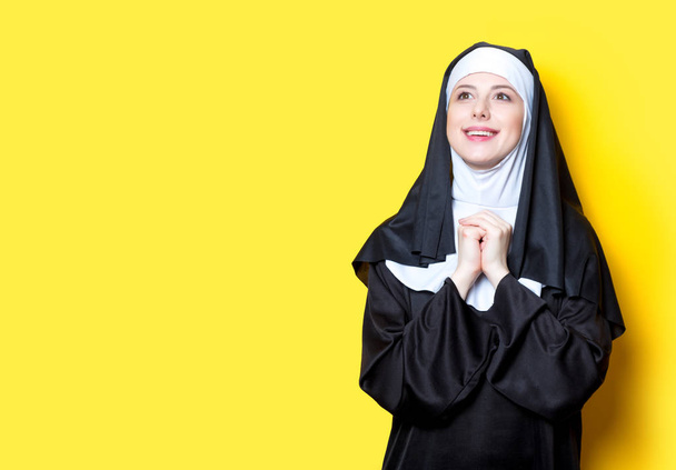 Young happy nun  - 写真・画像