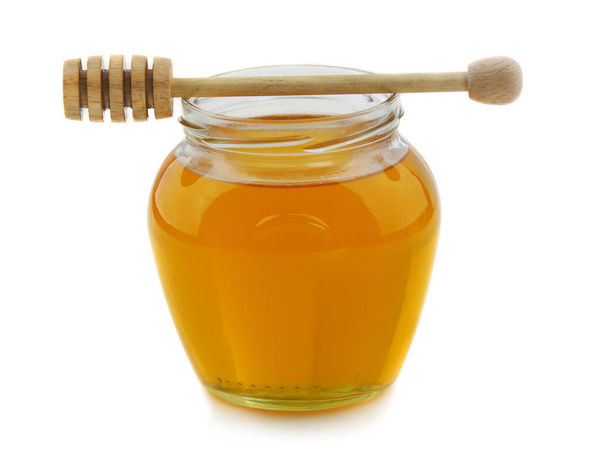 Honey jar and dipper - Φωτογραφία, εικόνα