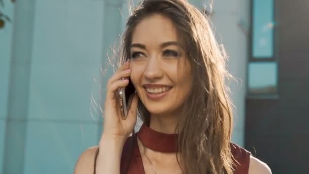 Talking by Phone Before Modern Building - Video, Çekim