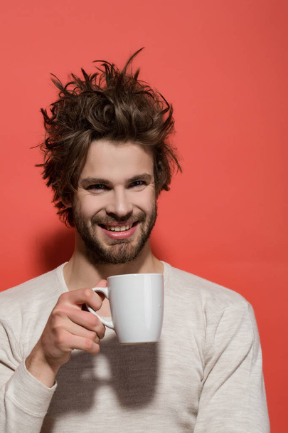 cup of tea or coffee at happy man - Fotó, kép