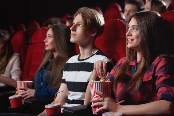 Group of people enjoying movie at the cinema - Fotoğraf, Görsel