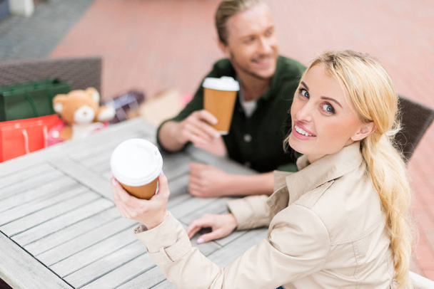 couple drinking coffee at cafe - Fotoğraf, Görsel