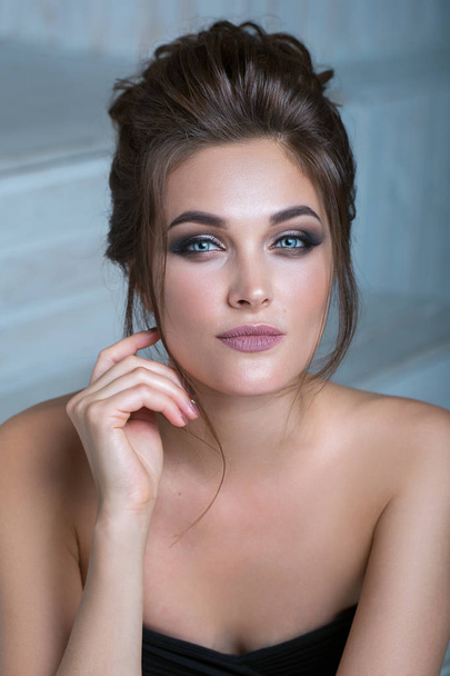 Beautiful model girl with elegant hairstyle . Woman with fashion - Fotografie, Obrázek