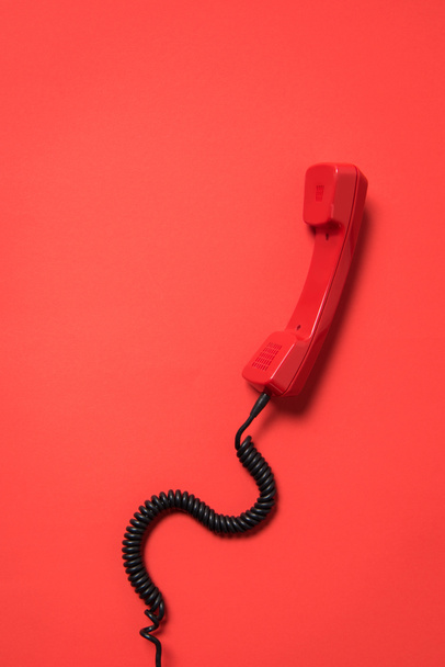 Teléfono rojo auricular
 - Foto, imagen