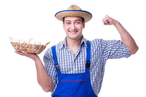 Homem com chapéu de palha e ovos
 - Foto, Imagem