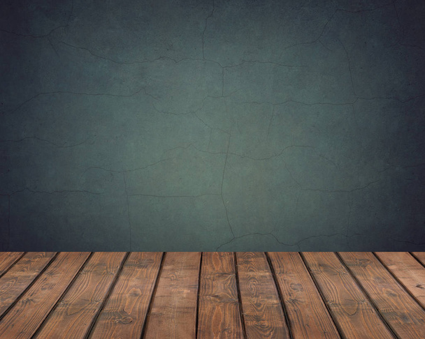 Blank wooden flooring on a background of the blue wall. - Фото, зображення