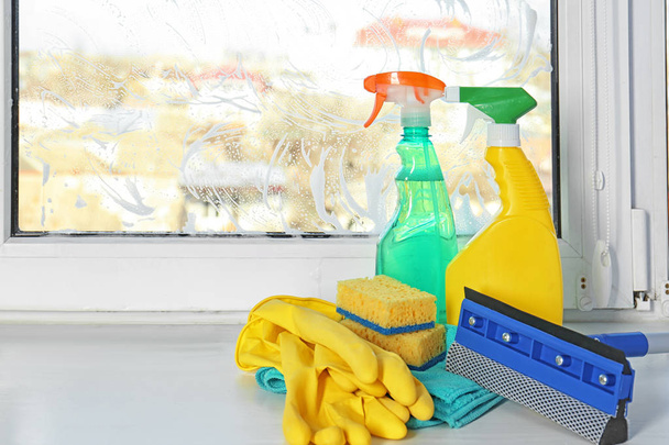Cleaning supplies on window sill - Foto, Imagem
