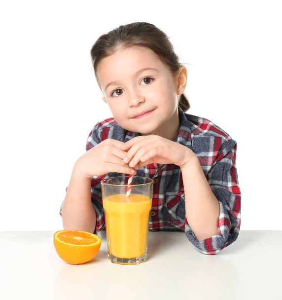 Cute little girl with glass of juice - Fotó, kép