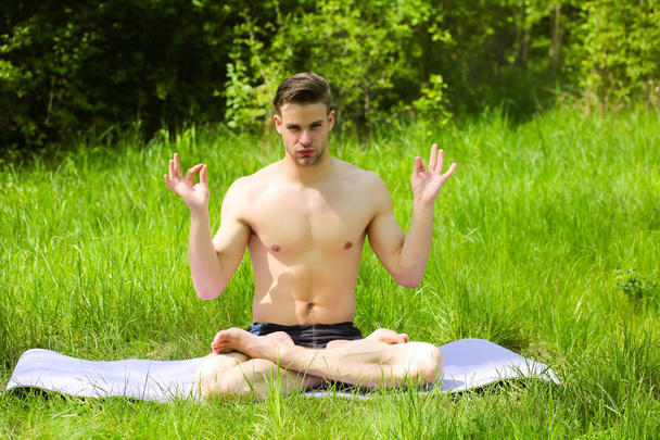 Concept of yoga presented by man with naked torso - Foto, Imagem