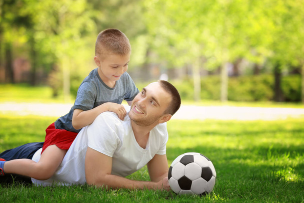 Father and son with soccer ball  - Φωτογραφία, εικόνα