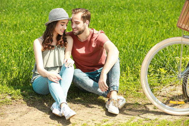 young couple with bicycle - Photo, Image