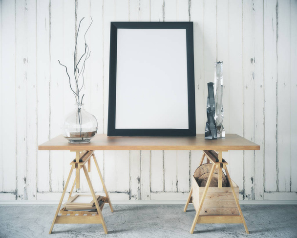 Wooden table with blank frame - 写真・画像