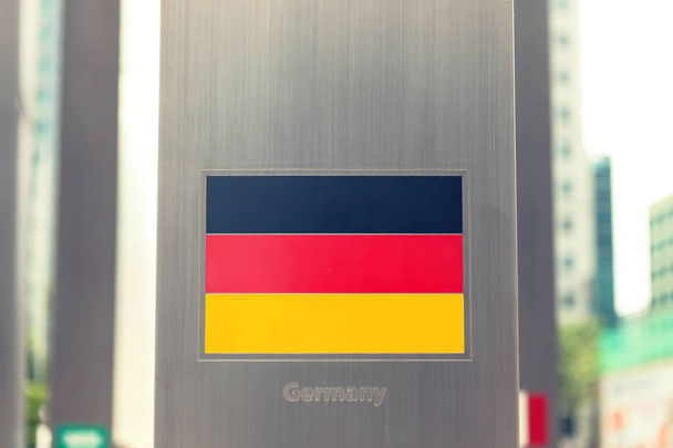 Reeks van nationale vlaggen op paal - Duitsland. Gefilterde afbeelding: Kruis verwerkt vintage effect. - Foto, afbeelding