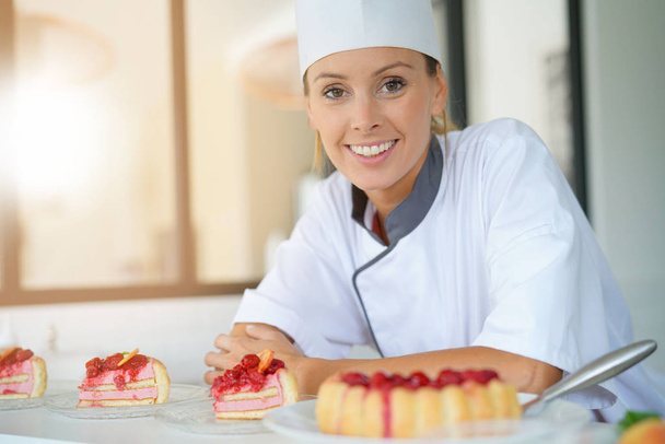 chef standing in restaurant kitchen - Foto, Bild