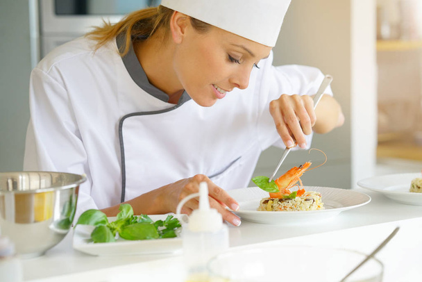 Chef preparing dish  - Foto, afbeelding