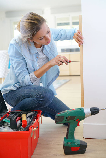 Woman doing DIY work - Фото, зображення