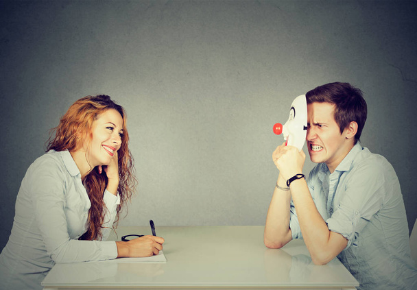 Woman interviewing new candidate for a job, a man pretender hiding his real personality   - Photo, Image
