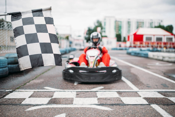 Karting racer wearing helmet  - Valokuva, kuva