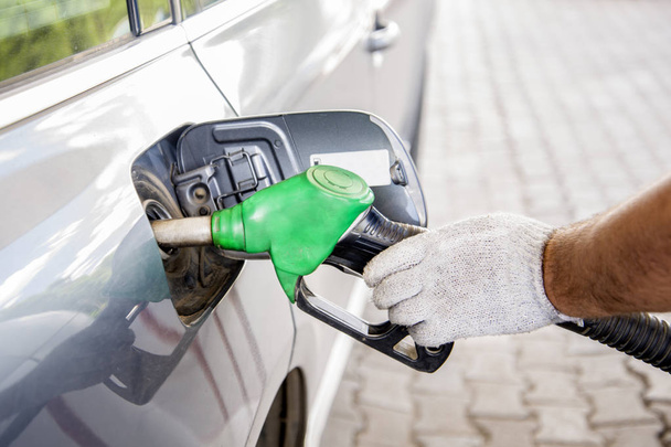 Automobile refueling with gasoline - Фото, изображение