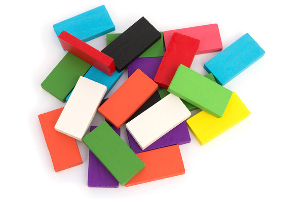 top view colorful wooden toy blocks on white background - Foto, afbeelding
