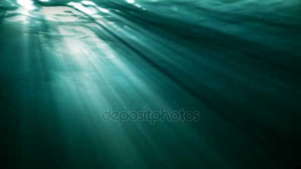 Animación de bucle de alta calidad de las olas del océano de realista bajo el agua. Rayos de luz brillando a través
 - Metraje, vídeo