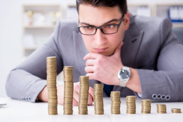 Businessman with golden coins in business growth concept - Photo, Image