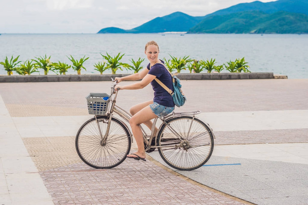 carefree woman with bicycle  - Photo, image