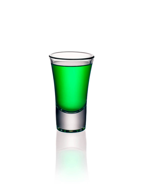 Glass shot with green absinthe isolated - Photo, Image