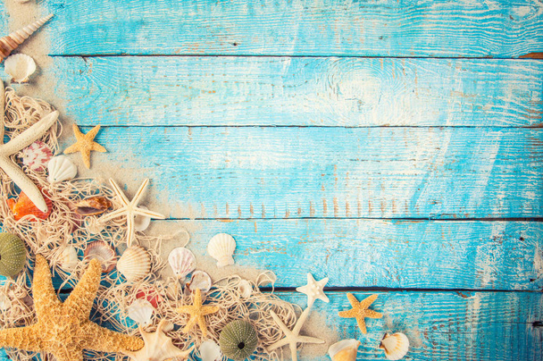 Summer traveling time. Sea holiday background with various shells. - Foto, afbeelding