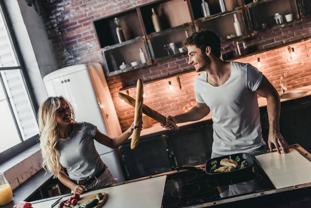 Couple on kitchen - Fotoğraf, Görsel