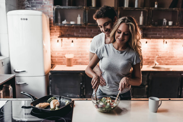 Couple on kitchen - Fotó, kép